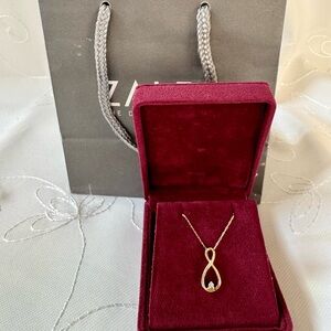 Zales Gold Infinity Necklace with a single solitaire (0.15ct) white diamond